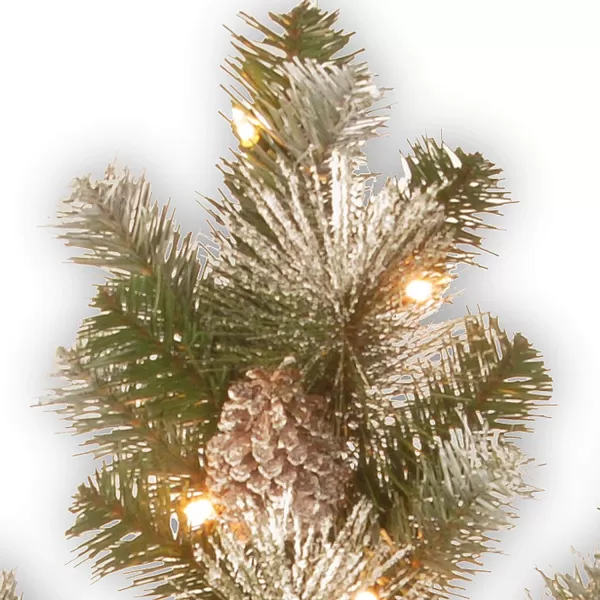 imageNational Tree 32 Inch Snow Capped Mountain Pine Snowflake with Cones and 50 Battery Operated Warm White LED Lights with Timer SCM130032SB1