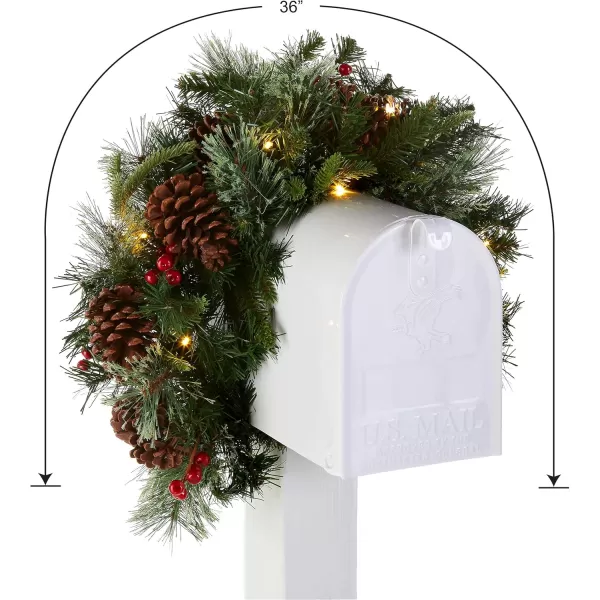 imageNational Tree Company Prelit Artificial Christmas Mail Box Swag Flocked with Mixed Decorations and White LED Lights Colonial36 InchMail Box