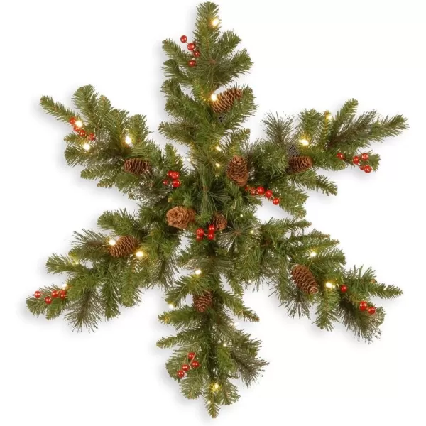 imageNational Tree Company PreLit Artificial Christmas Hanging Snowflake Green Crestwood Spruce Decorated with Pine Cones Berry Clusters Christmas Collection 32 Inches