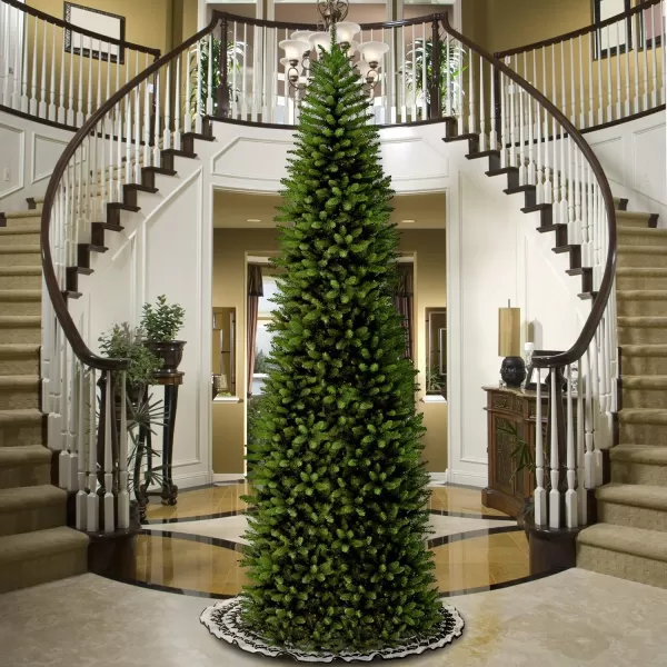 imageNational Tree Company Artificial Slim Christmas Tree Green Kingswood Fir Includes Stand 14 Feet