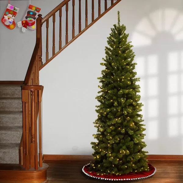 imageNational Tree Company PreLit Artificial Slim Christmas Tree Green North Valley Spruce White Lights Includes Stand 7 Feet