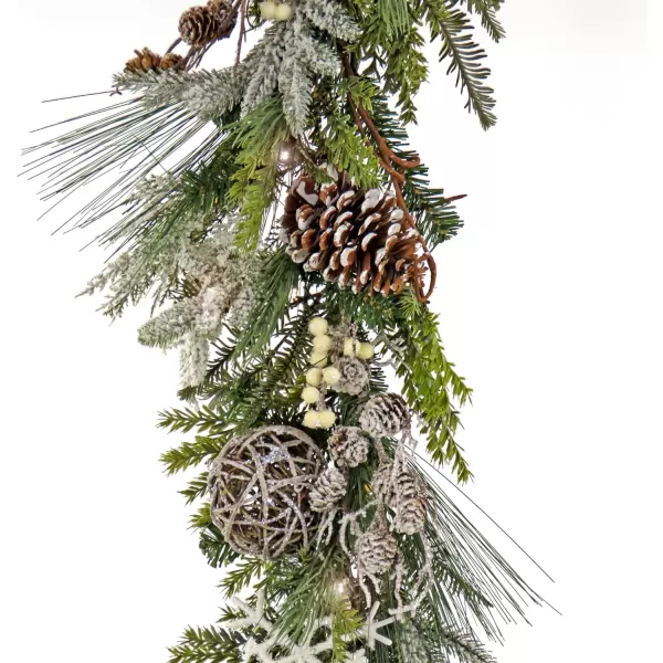 imageHGTV Home Collection Pre Lit Artificial Christmas Garland Mixed Branch Tips Decorated with Pinecones Berries Snowflakes and Ornaments Battery Powered 9 Feet