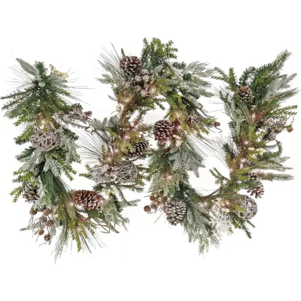 imageHGTV Home Collection Pre Lit Artificial Christmas Garland Mixed Branch Tips Decorated with Pinecones Berries Snowflakes and Ornaments Battery Powered 9 Feet