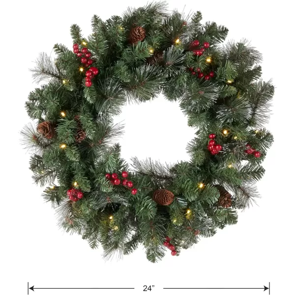 imageNational Tree Company PreLit Artificial Christmas Wreath Green Crestwood Spruce White Lights Decorated with Pine Cones Berry Clusters Frosted Branches Christmas Collection 24 InchesCrestwood Spruce  24 inch