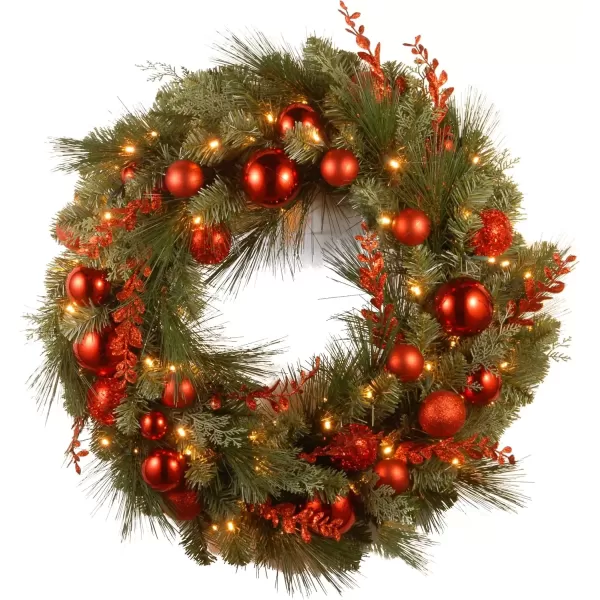 imageNational Tree Company PreLit Artificial Christmas Wreath Green Evergreen White Lights Decorated with Ball Ornaments Red Sprigs Christmas Collection 24 Inches24Inch