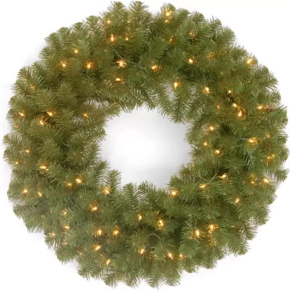 imageNational Tree Company PreLit Artificial Christmas Wreath Green North Valley Spruce White Lights Christmas Collection 24 Inches NRV7300D24WB1