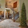 imageNational Tree Company Artificial Giant Slim Christmas Tree Green North Valley Spruce White Lights Includes Stand 10 Feet