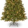 imageNational Tree Company PreLit Artificial Slim Christmas Tree Green Aspen Spruce White Lights Includes Stand 6 Feet7ft