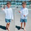 imageBIG ELEPHANT 3 Pack Kids Rash Guard Swim Shirt UPF 50 Long Sleeve Rashguard Swimwear Surf Tops Sun Protection for Boys GirlsNeon GreenGreenWhite
