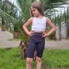imageBIG ELEPHANT 4 Packs Girls Athletic Bike Shorts Dance Yoga Running Soccer Kids Compression Shorts with PocketsNavy Bluelight Graypinkblue