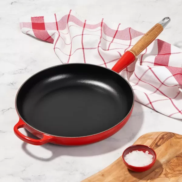 imageLe Creuset Enameled Cast Iron Alpine Wood Handle Fry Pan 1025quot LicoriceCerise