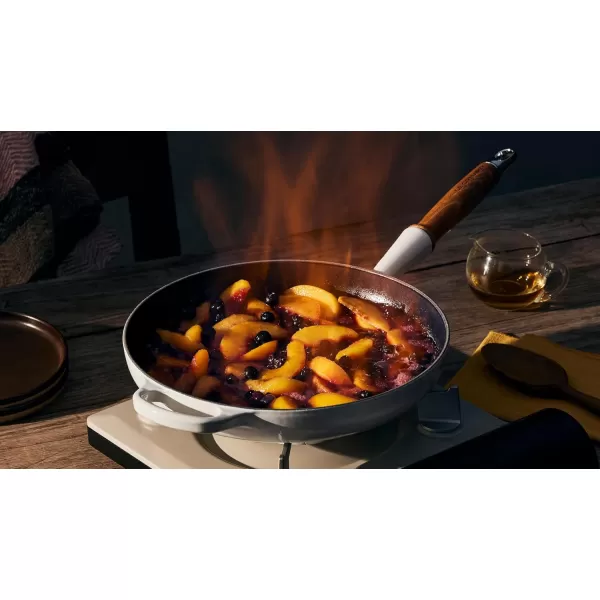 imageLe Creuset Enameled Cast Iron Alpine Wood Handle Fry Pan 1025quot LicoriceFlame
