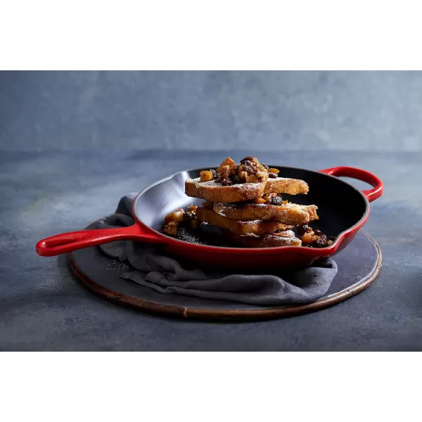 imageLe Creuset Enameled Cast Iron Signature Iron Handle Skillet 1175quot 238 qt CeriseCerise