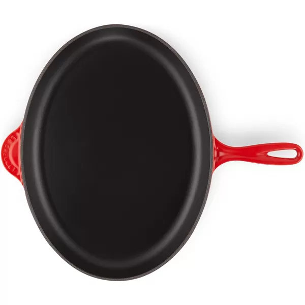 imageLe Creuset Enameled CastIron 1575 Inch Oval Skillet FlameCherry Red