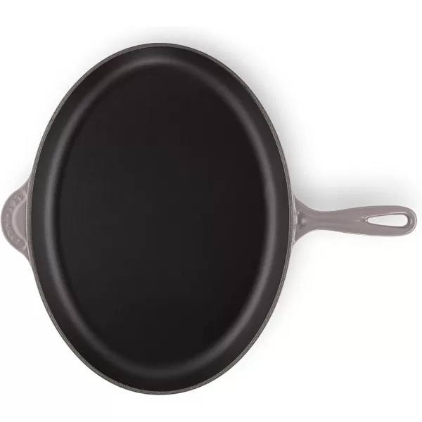 imageLe Creuset Enameled CastIron 1575 Inch Oval Skillet FlameOyster