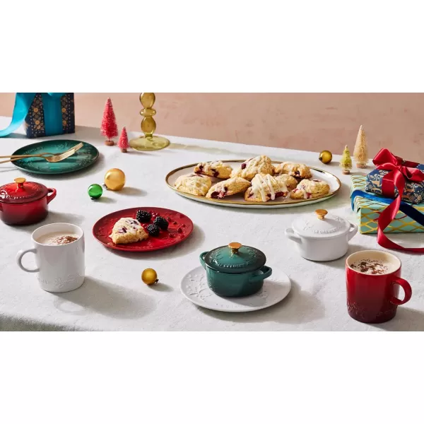 imageLe Creuset Stoneware Holly Collection Mini Round Cocotte 8 Oz Cerise with Gold KnobArtichaut