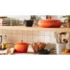 imageLe Creuset Enameled Cast Iron Signature Oval Dutch Oven 155 qt Flamme Doree with Crucible Knob23 Quarts
