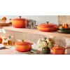 imageLe Creuset Enameled Cast Iron Signature Oval Dutch Oven 155 qt Flamme Doree with Crucible Knob5 qt