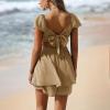 imageEXLURA Womens 2025 Summer Ruffle Short Sleeve Tie Back Romper Dress Square Neck A Line Cute Dressy Short JumpsuitsKhaki