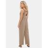 imageEXLURA Womens Summer Casual Dressy Jumpsuits Loose Overalls One Piece Sleeveless Wide Leg Pant Rompers with Pockets 2025Light Brown