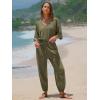imageEXLURA Womens 2025 Summer Jumpsuits Casual Dressy One Piece Deep V Neck Batwing Short Sleeve Wrap Waist Romper with PocketsArmy Green