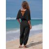 imageEXLURA Womens 2025 Summer Jumpsuits Casual Dressy One Piece Deep V Neck Batwing Short Sleeve Wrap Waist Romper with PocketsBlack