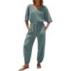 imageEXLURA Womens 2025 Summer Jumpsuits Casual Dressy One Piece Deep V Neck Batwing Short Sleeve Wrap Waist Romper with PocketsGrey Blue