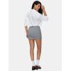 imageEXLURA Womens Fall Plaid Bodycon Mini Skirts High Elastic Wasit Short Skirt Trendy Winter Sexy Y2K Fashion OutfitBlack White